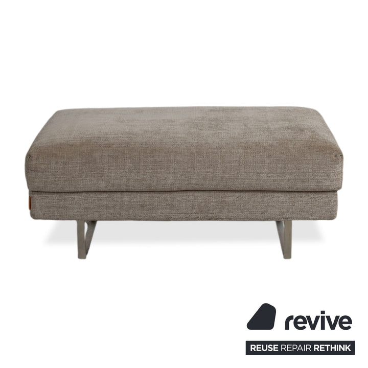 Montis Axel Stoff Hocker Grau