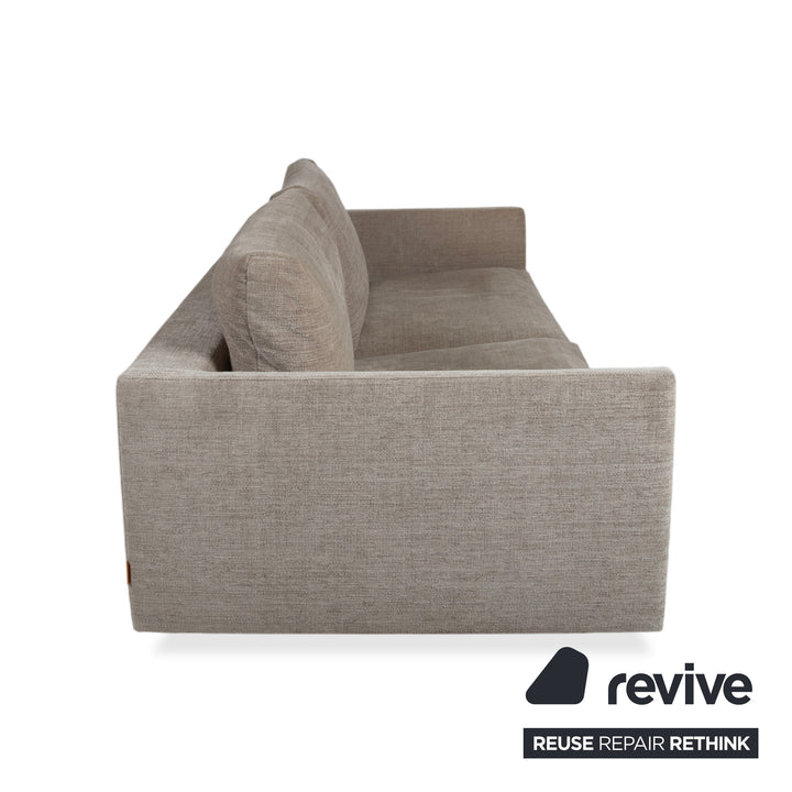 Canapé quatre places en tissu gris Montis Axel