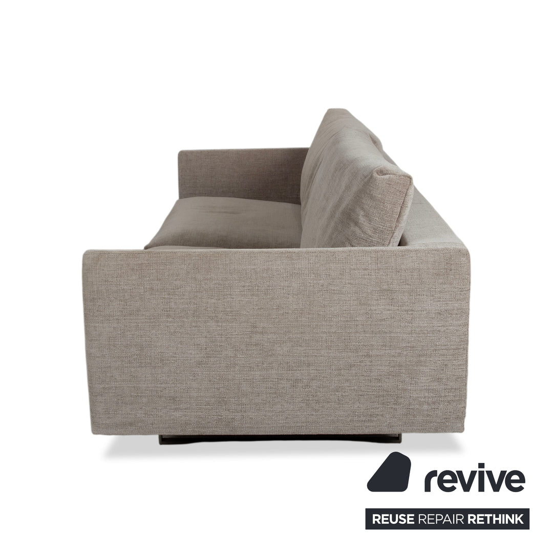 Canapé quatre places en tissu gris Montis Axel