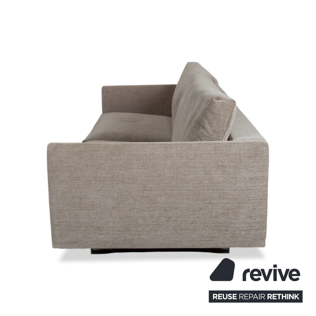 Tabouret quatre places en tissu Montis Axel, canapé gris