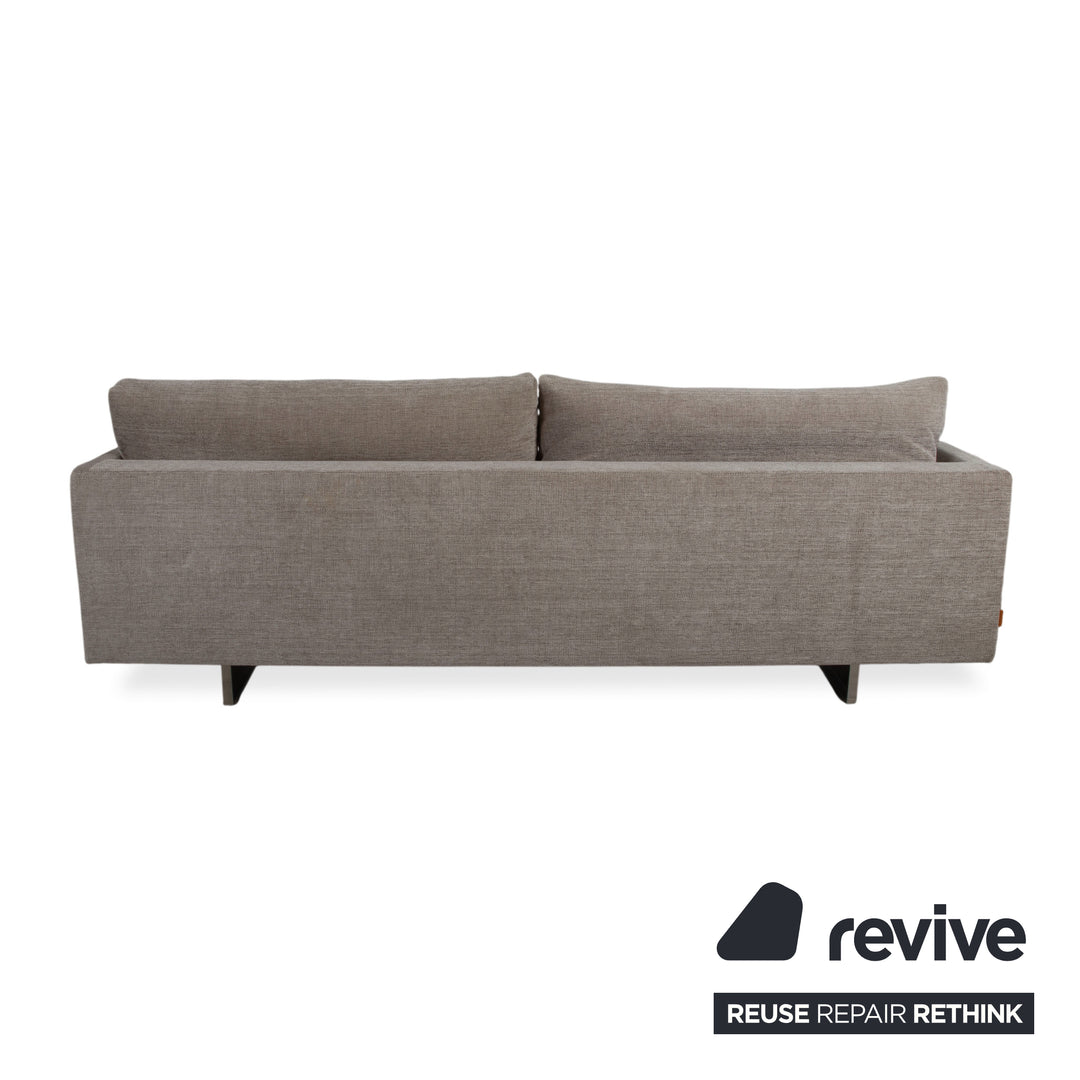 Tabouret quatre places en tissu Montis Axel, canapé gris