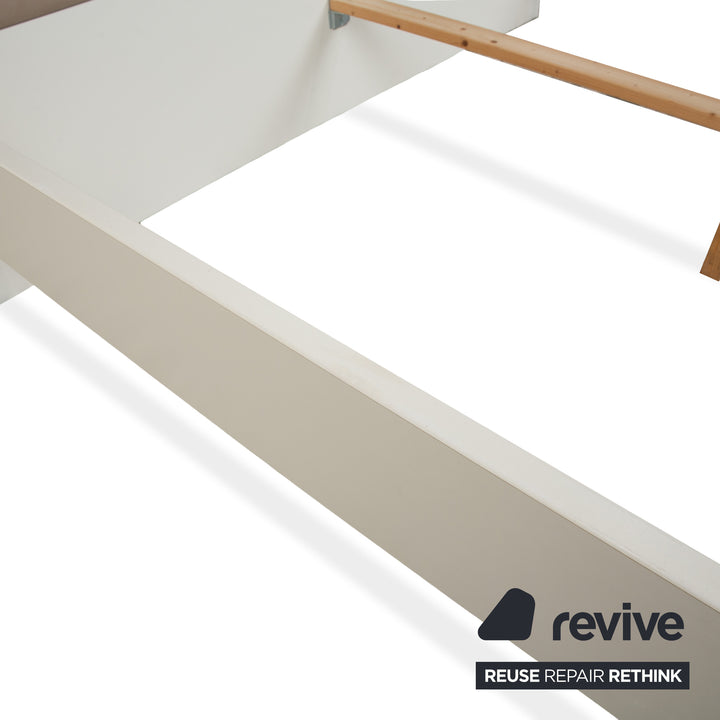 Lit en bois et cuir beige