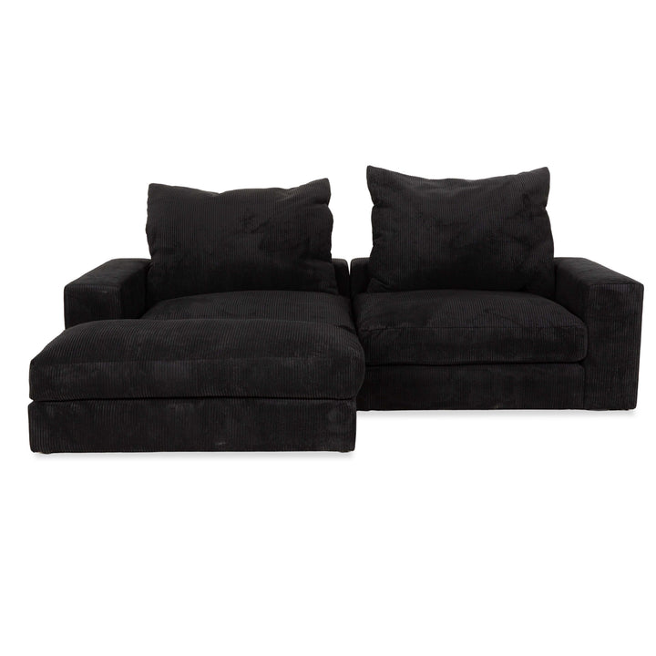 Canapé quatre places en tissu MYCS FLAYR avec tabouret noir