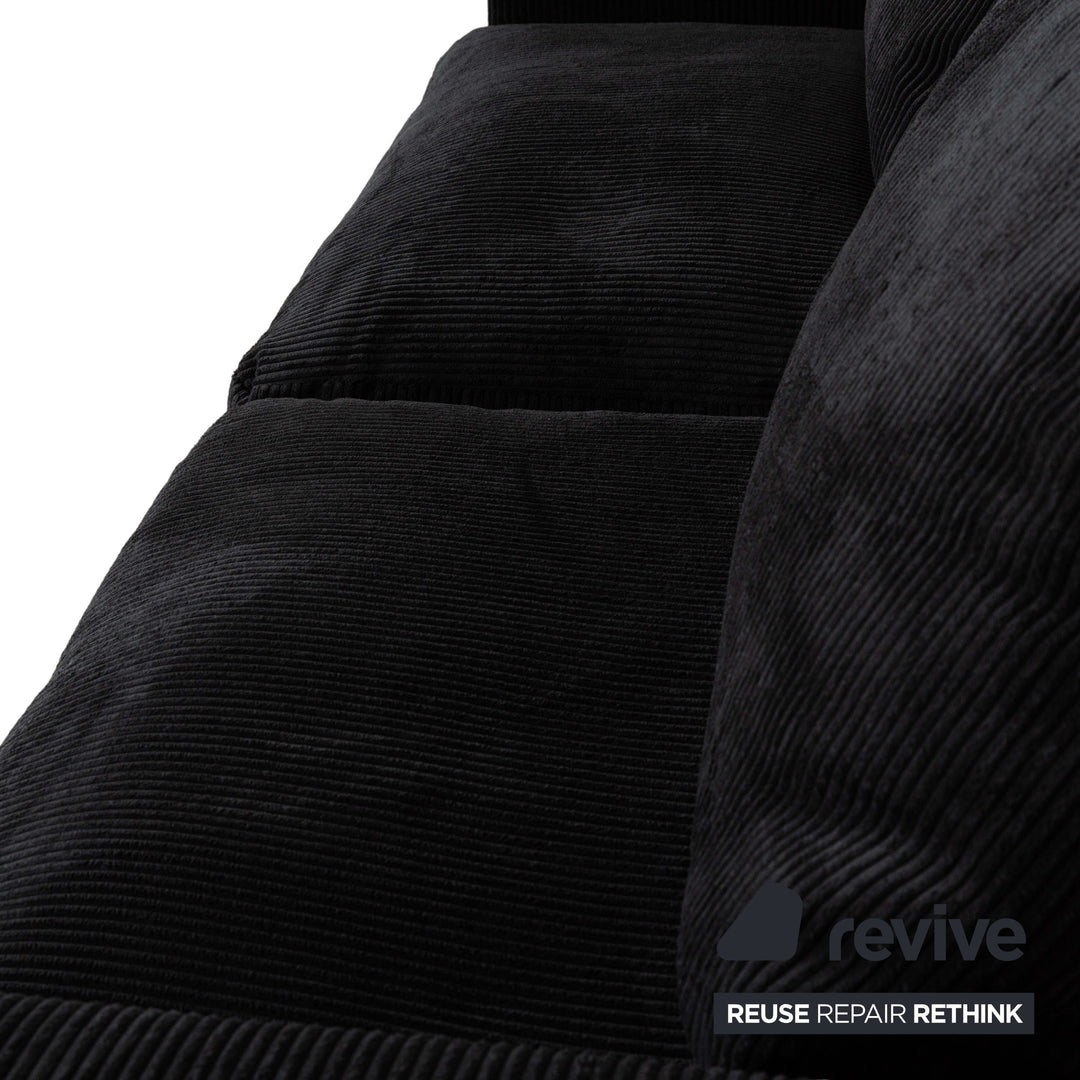 Canapé quatre places en tissu noir MYCS FLAYR