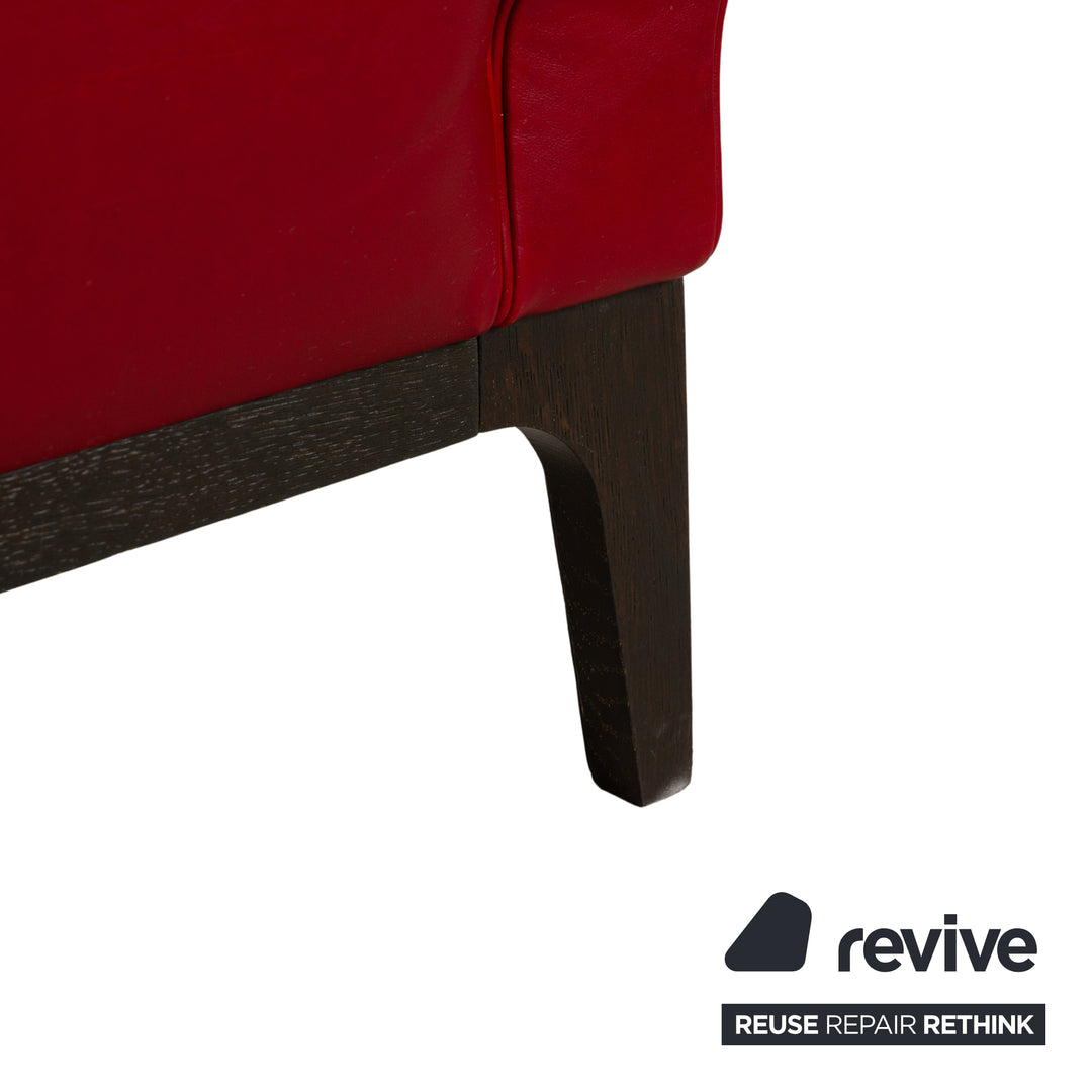 Fauteuil en cuir cristal Natuzzi rouge cerise