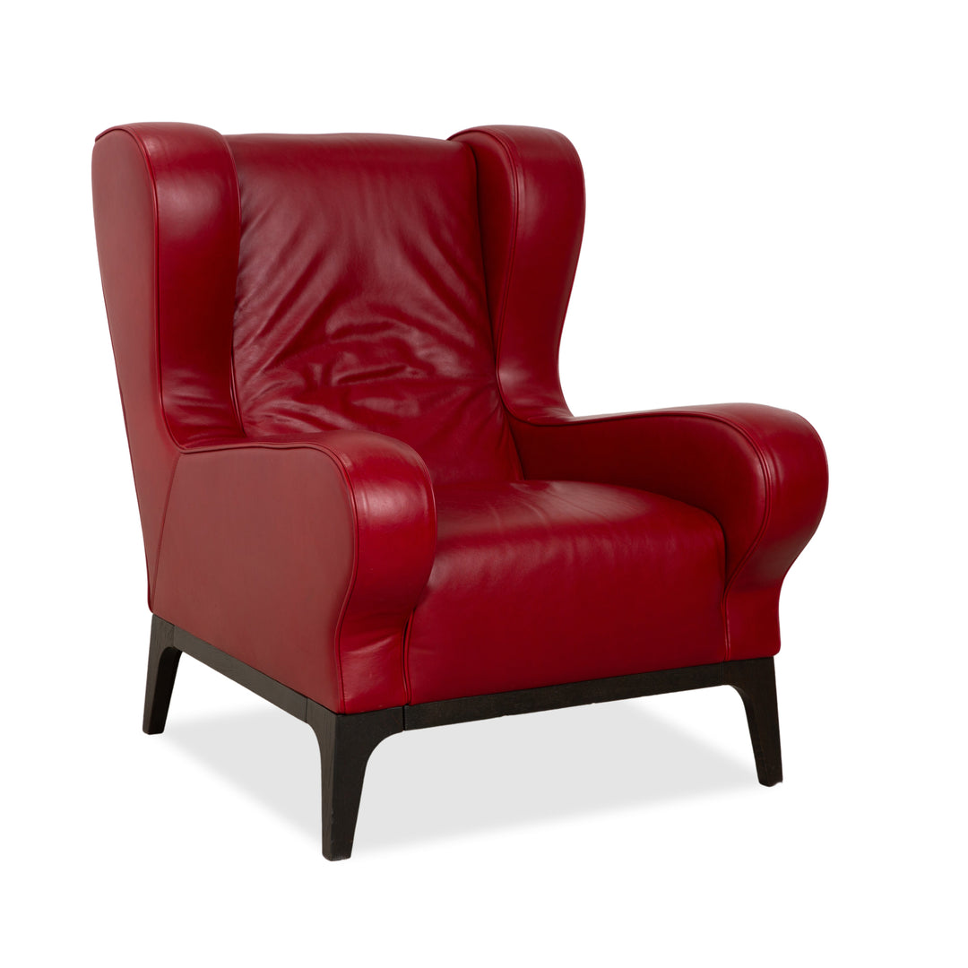 Fauteuil en cuir cristal Natuzzi rouge cerise
