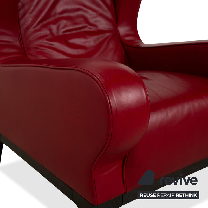 Fauteuil en cuir cristal Natuzzi rouge cerise