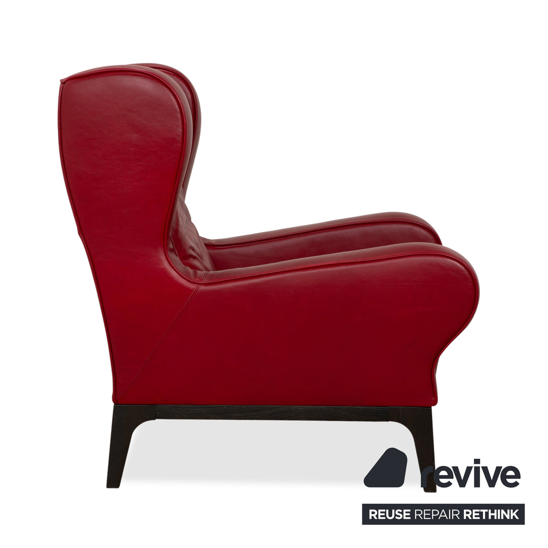 Fauteuil en cuir cristal Natuzzi rouge cerise