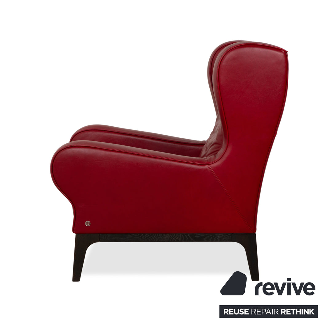 Fauteuil en cuir cristal Natuzzi rouge cerise