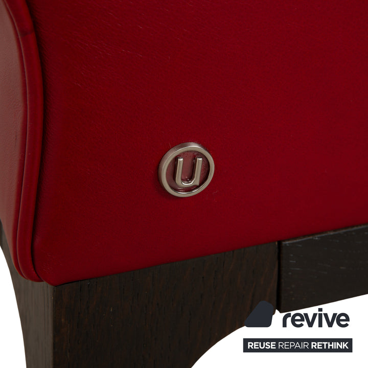 Fauteuil en cuir cristal Natuzzi rouge cerise