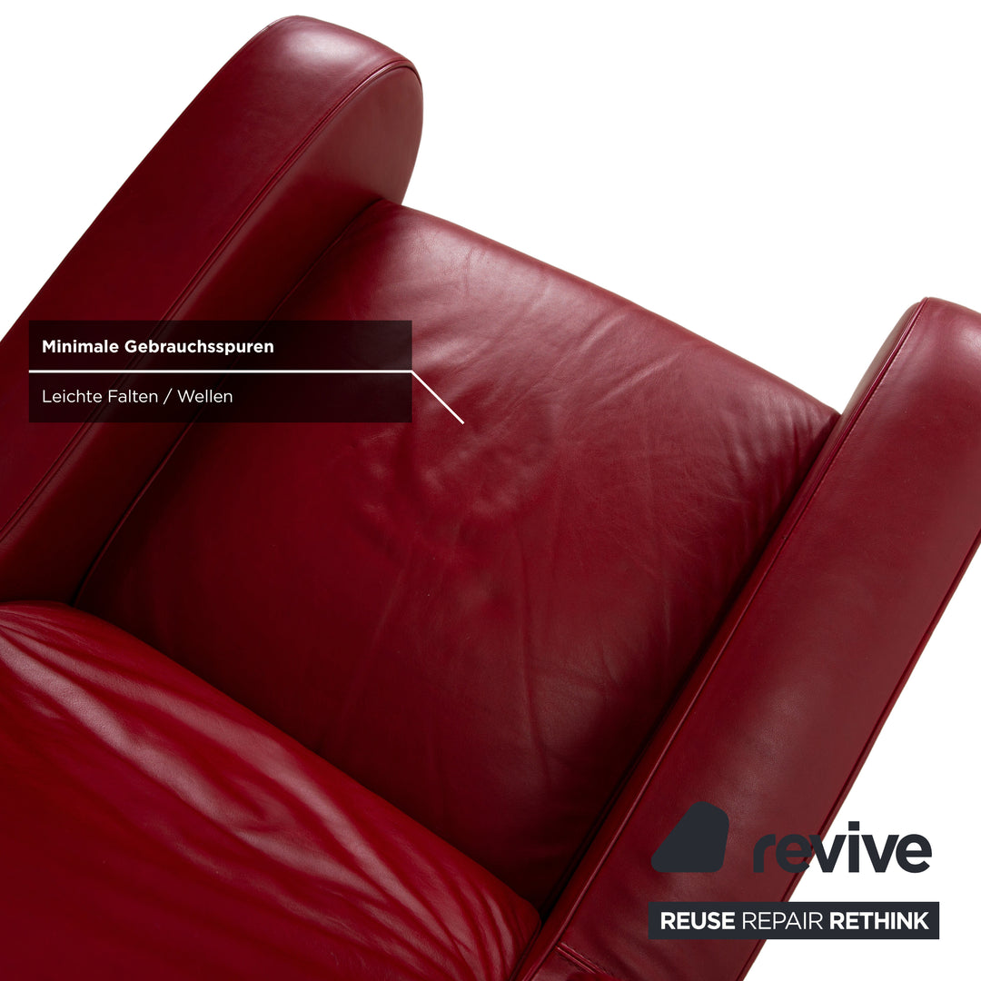 Fauteuil en cuir cristal Natuzzi rouge cerise