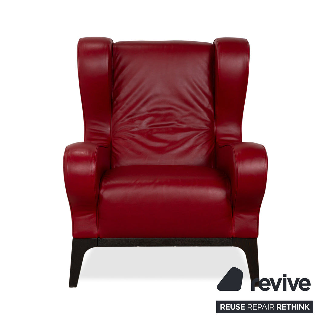 Fauteuil en cuir cristal Natuzzi rouge cerise