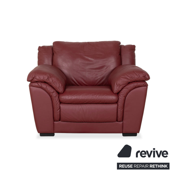 Fauteuil Natuzzi en cuir rouge