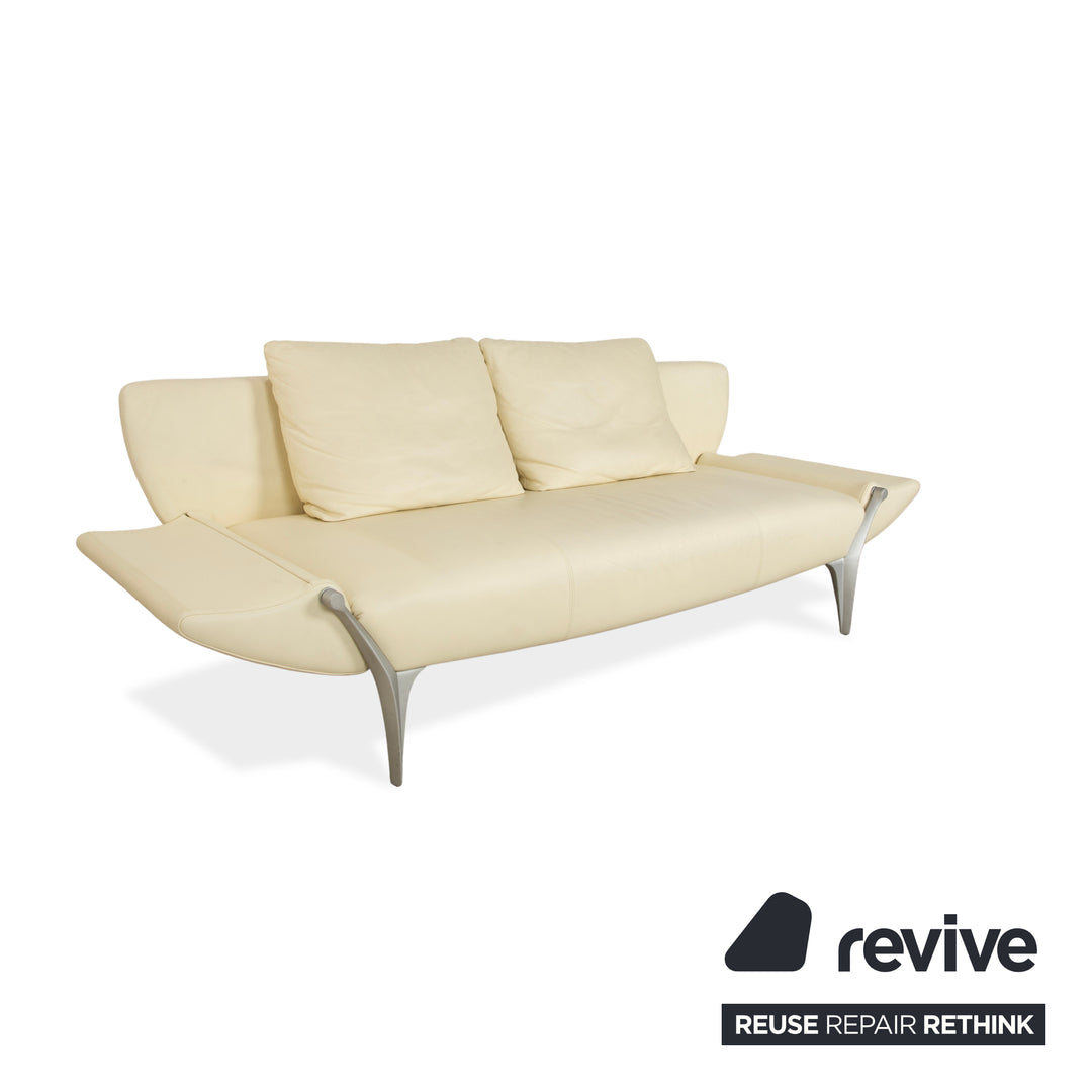 Canapé deux places en cuir Rolf Benz 1600 + tabouret blanc crème, fonction manuelle