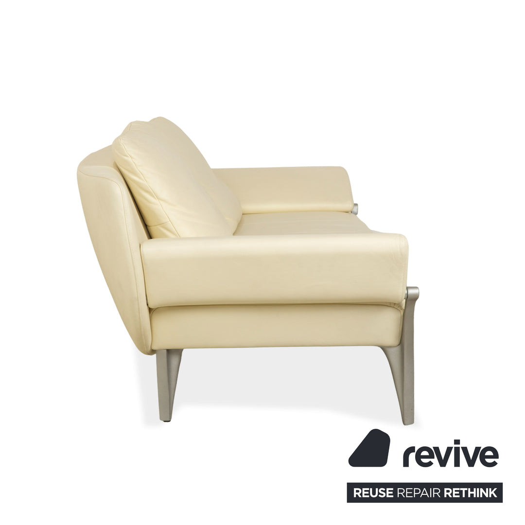 Canapé deux places en cuir Rolf Benz 1600 + tabouret blanc crème, fonction manuelle