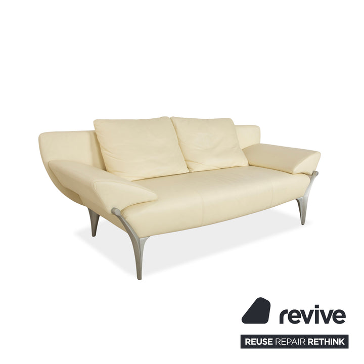 Canapé deux places en cuir Rolf Benz 1600 + tabouret blanc crème, fonction manuelle