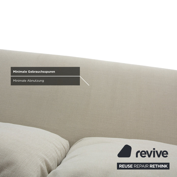 Canapé 2 places Rolf Benz 1600 en tissu crème menthe, à réglage manuel.