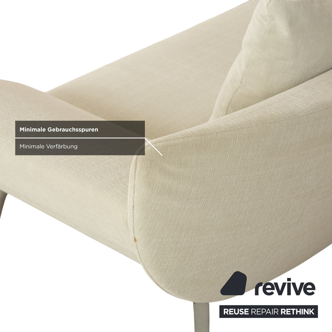 Canapé 2 places Rolf Benz 1600 en tissu crème menthe, à réglage manuel.