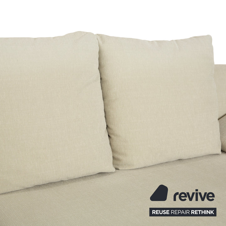 Canapé 2 places Rolf Benz 1600 en tissu crème menthe, à réglage manuel.