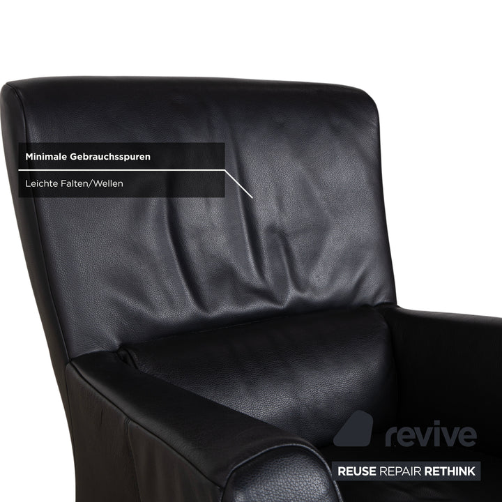 Fauteuil Rolf Benz 322 en cuir noir avec repose-pieds