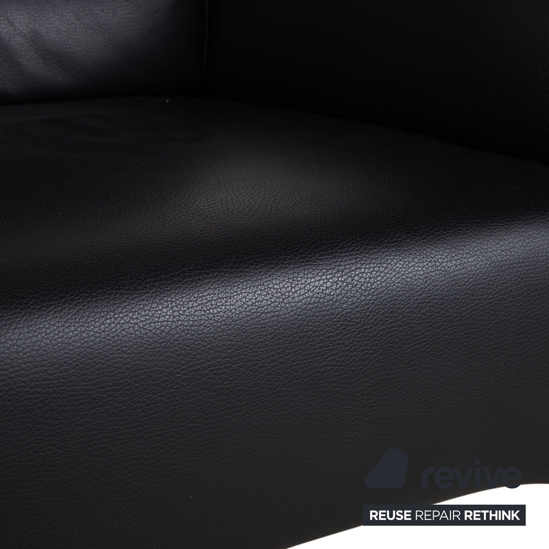 Fauteuil Rolf Benz 322 en cuir noir avec repose-pieds
