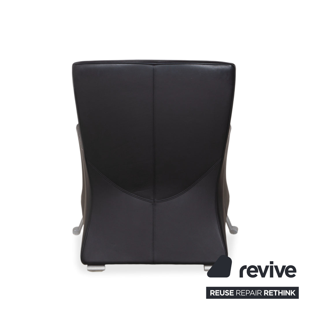 Fauteuil Rolf Benz 322 en cuir noir avec repose-pieds
