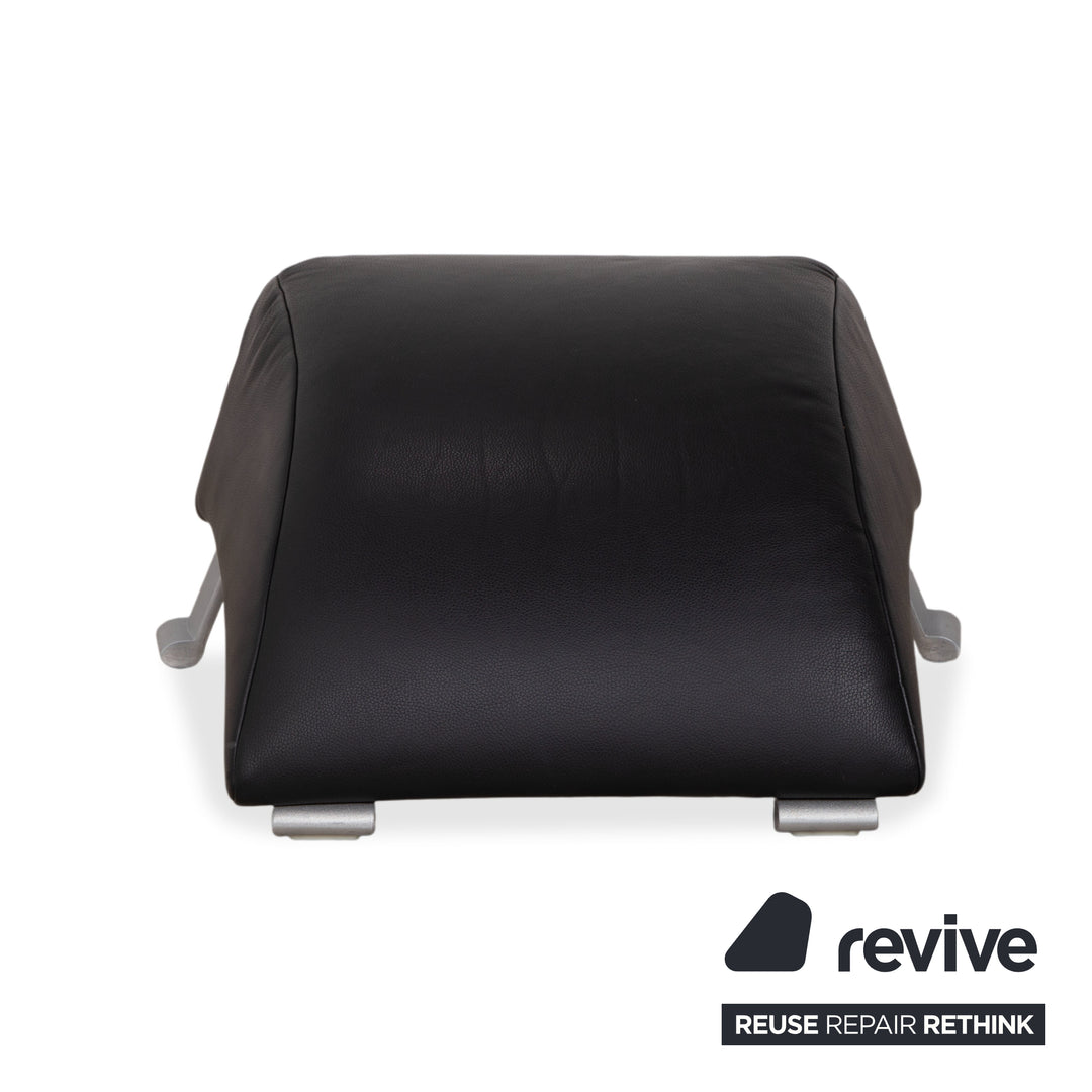 Fauteuil Rolf Benz 322 en cuir noir avec repose-pieds