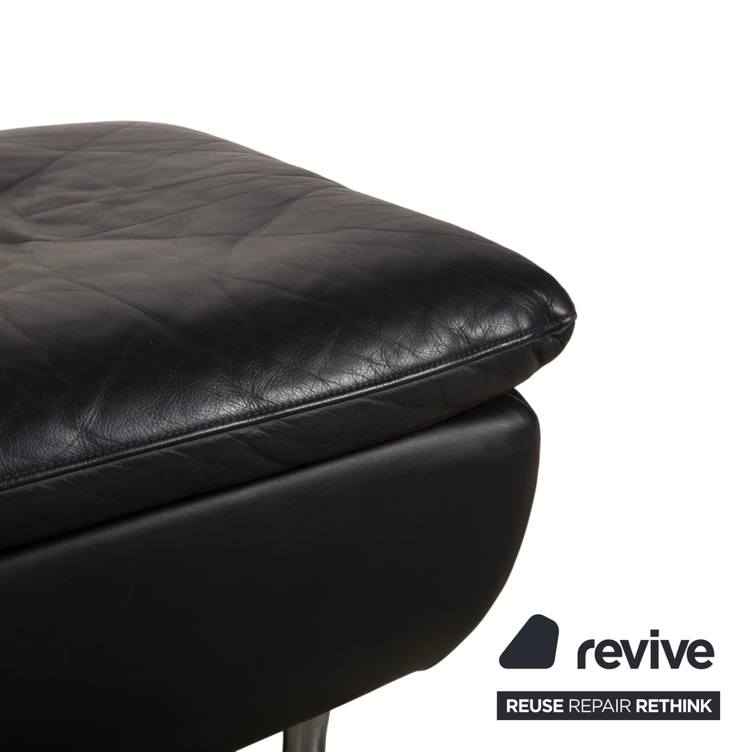 Fauteuil en cuir noir Rolf Benz 5600 avec pouf
