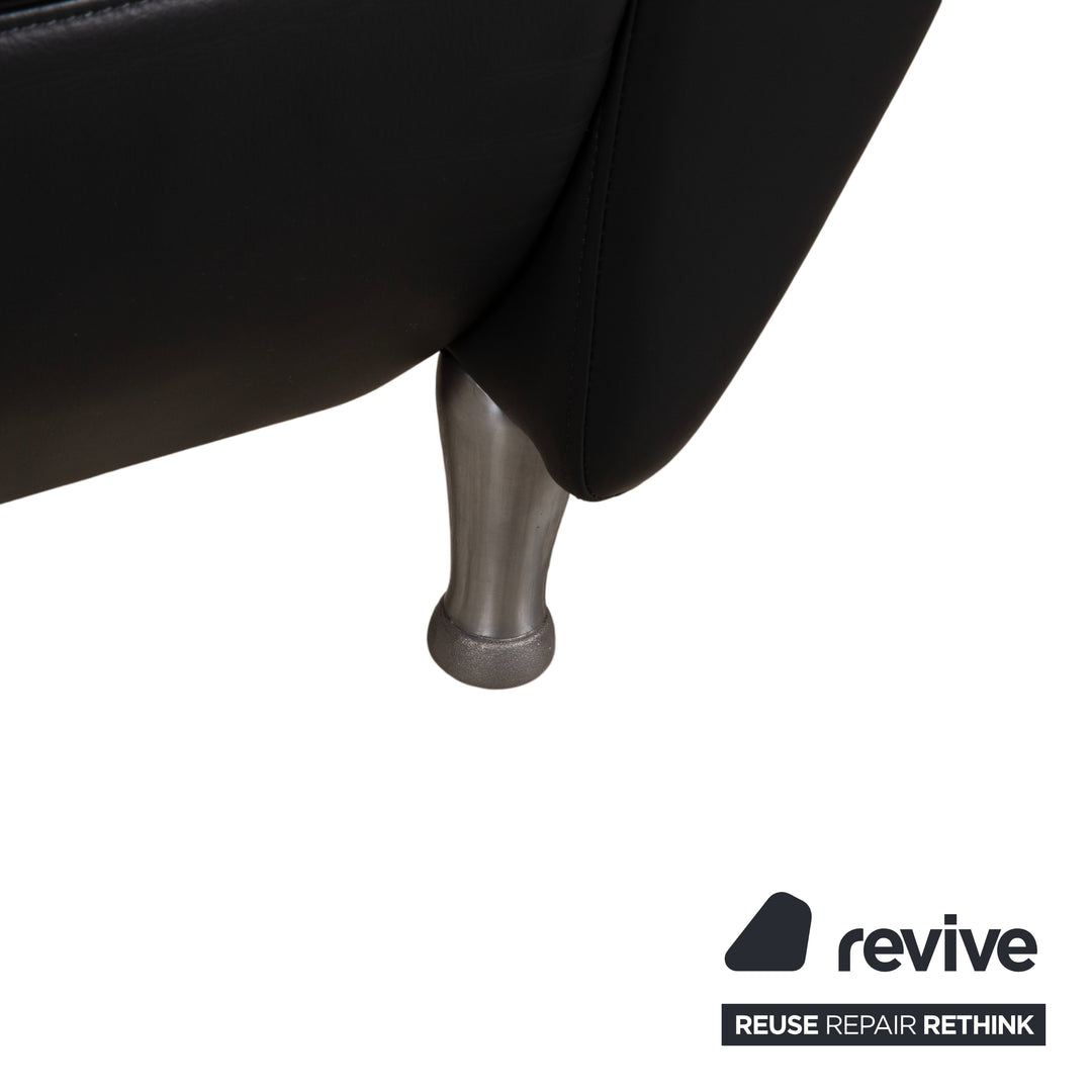 Fauteuil en cuir noir Rolf Benz 5600 avec pouf