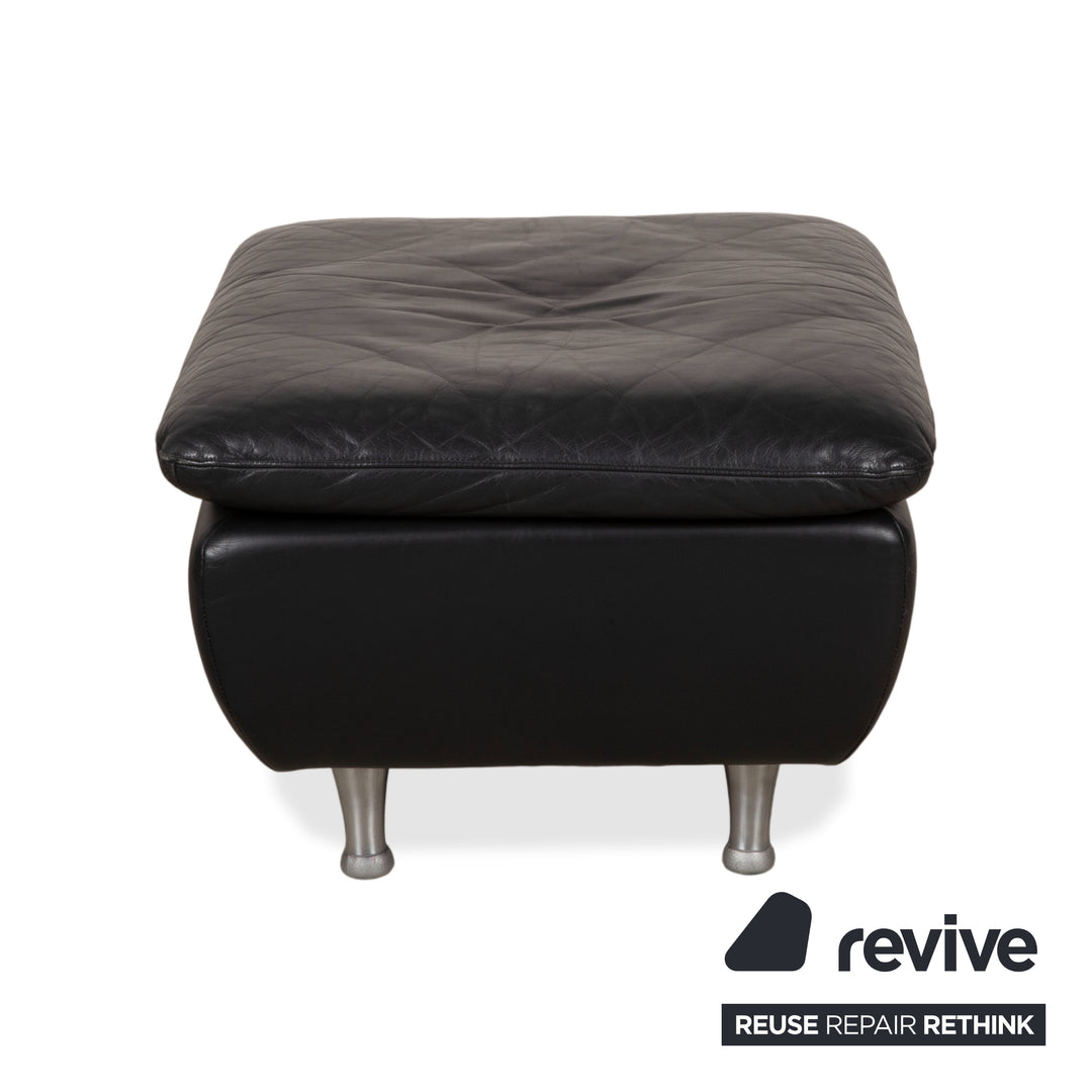 Fauteuil en cuir noir Rolf Benz 5600 avec pouf