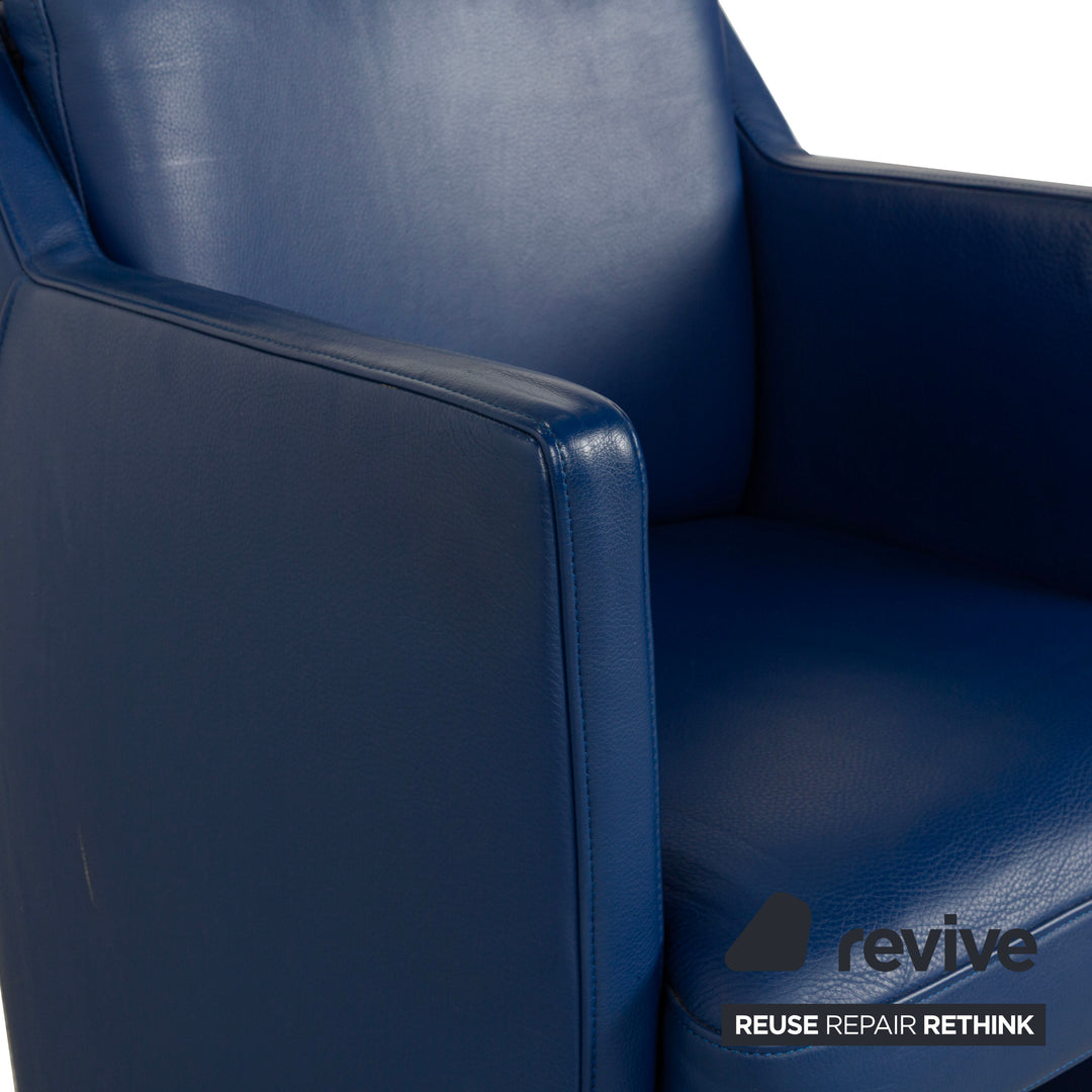 Rolf Benz leather armchair blue wheels