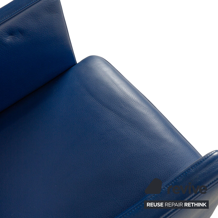 Rolf Benz leather armchair blue wheels