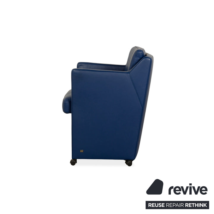 Rolf Benz leather armchair blue wheels