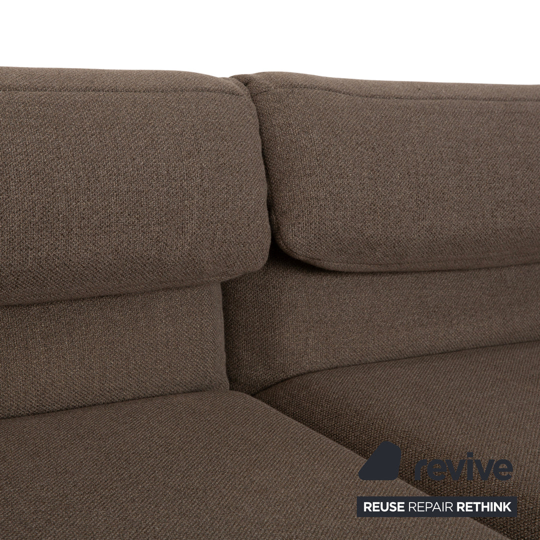 Canapé deux places Rolf Benz Plura en tissu gris à commande manuelle