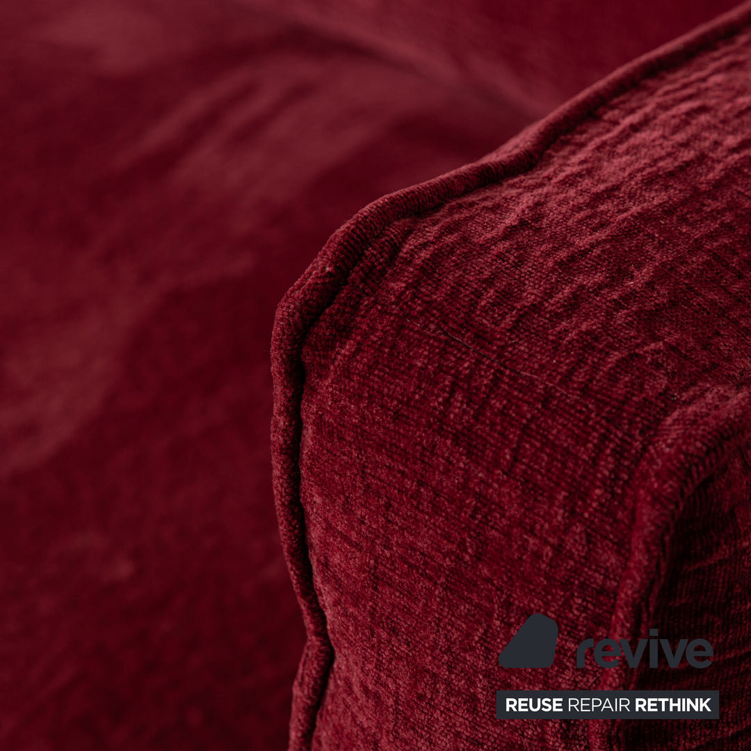 Fabric three-seater sofa red couch