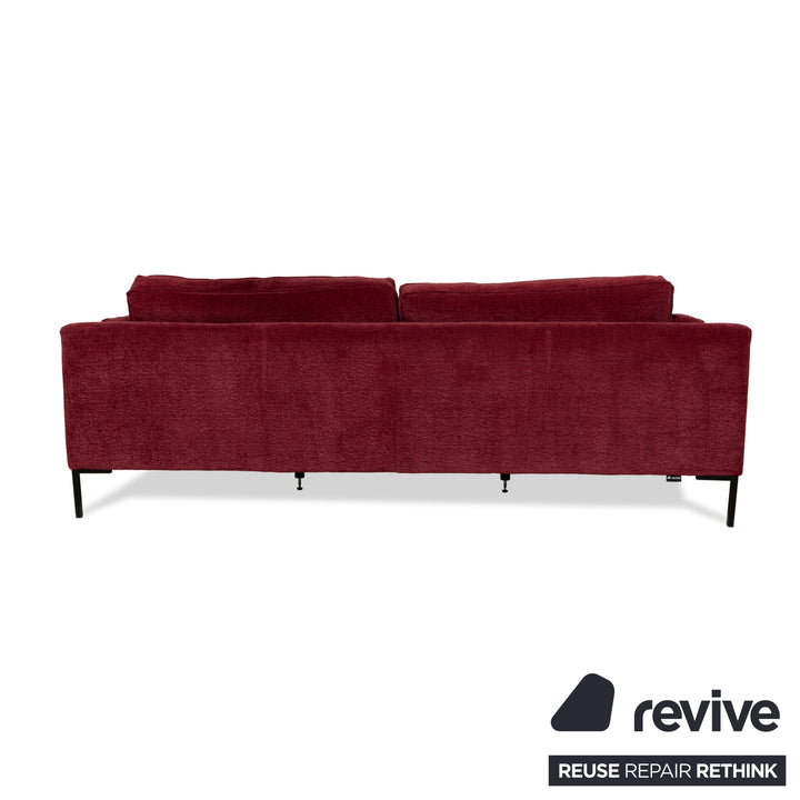 Fabric three-seater sofa red couch