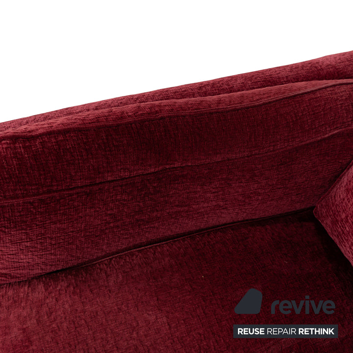 Fabric three-seater sofa red couch