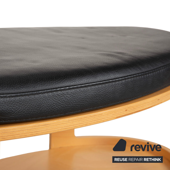 Tabouret de bar/table basse Stressless Arion en bois et cuir noir avec roulettes