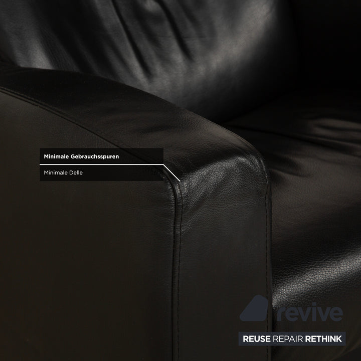 Fauteuil et repose-pieds en cuir noir Stressless Arion (x2) à commande manuelle