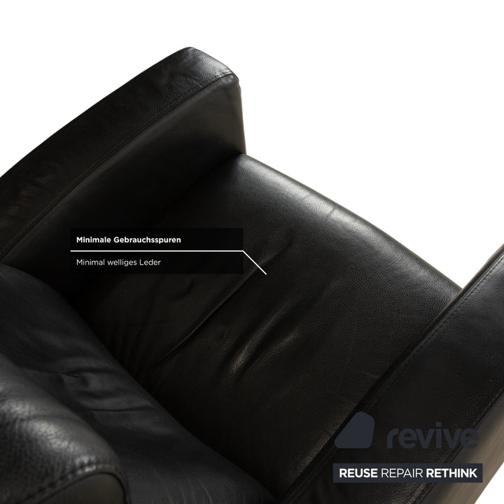 Fauteuil et repose-pieds en cuir noir Stressless Arion (x2) à commande manuelle