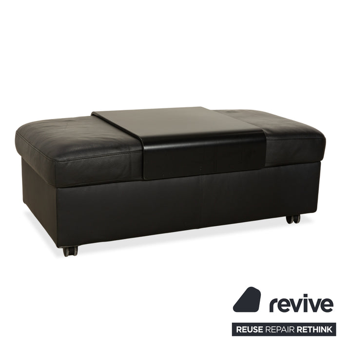 Fauteuil et repose-pieds en cuir noir Stressless Arion (x2) à commande manuelle