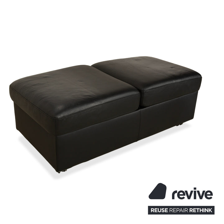 Fauteuil et repose-pieds en cuir noir Stressless Arion (x2) à commande manuelle