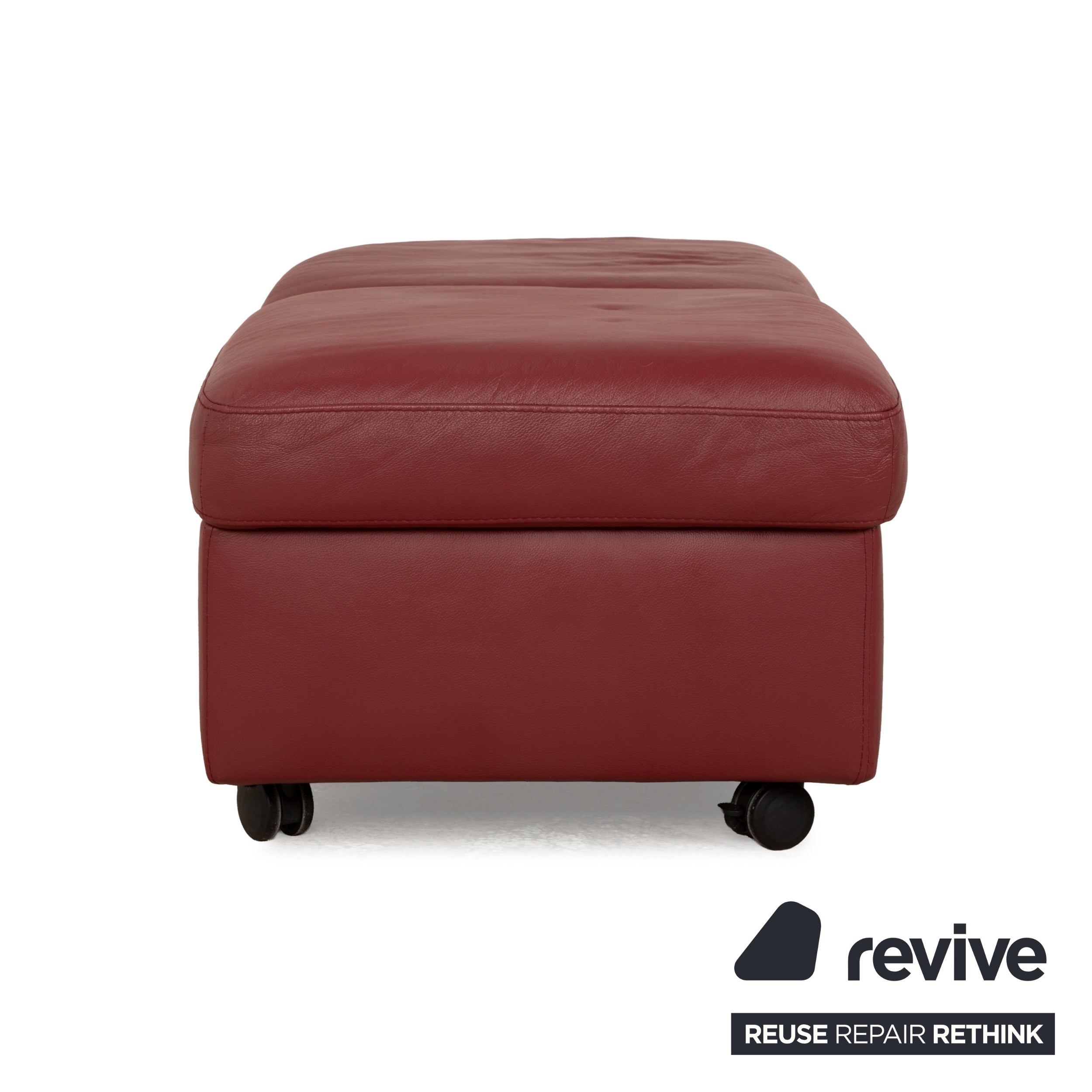 Tabouret Stressless Arion en cuir rouge avec roulettes et compartiment de rangement, fonction manuelle