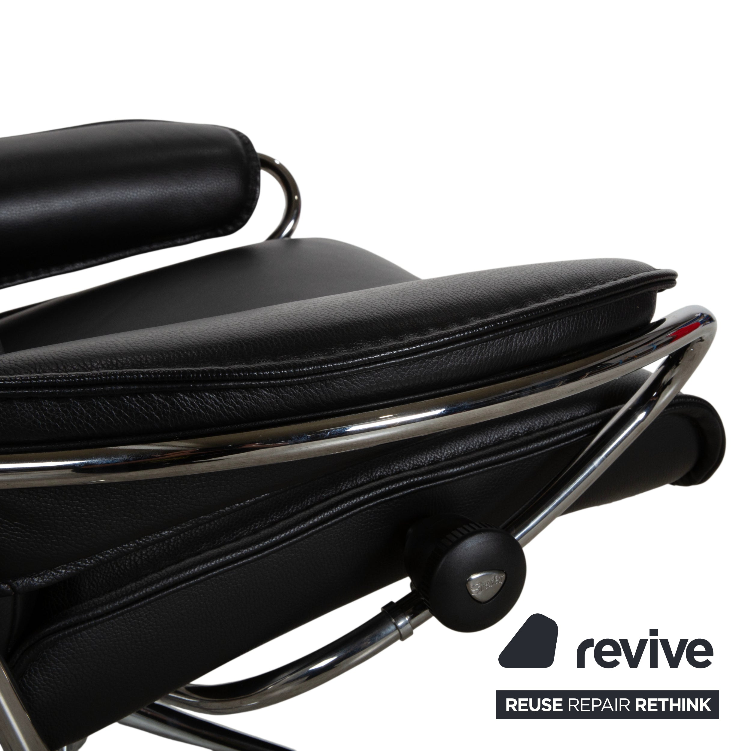Fauteuil Stressless City en cuir noir avec repose-pieds, fonction manuelle, piètement étoile
