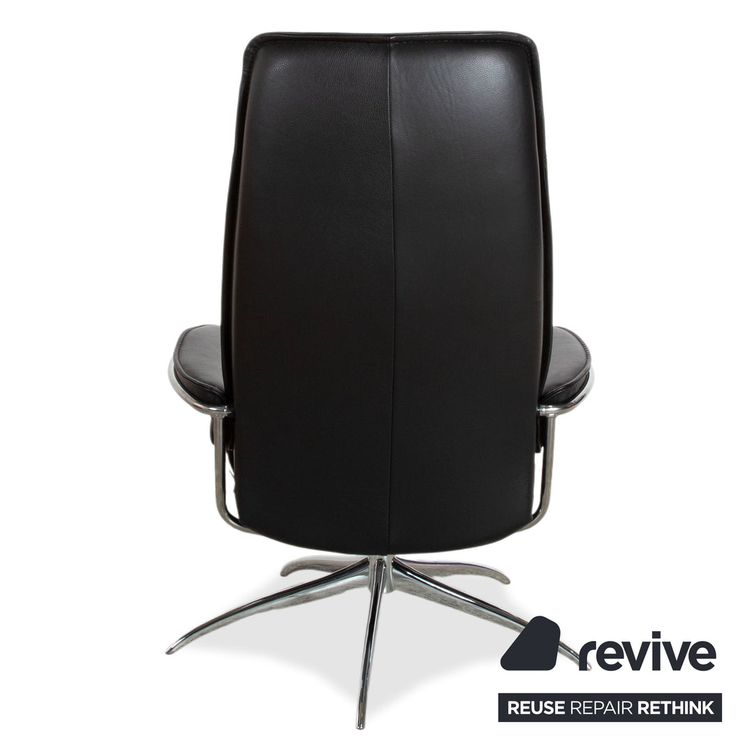 Fauteuil Stressless City en cuir noir avec repose-pieds, fonction manuelle, piètement étoile