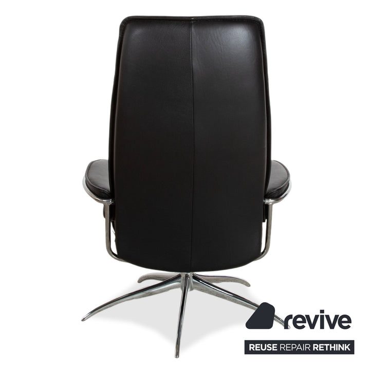 Fauteuil Stressless City en cuir noir avec repose-pieds, fonction manuelle, piètement étoile