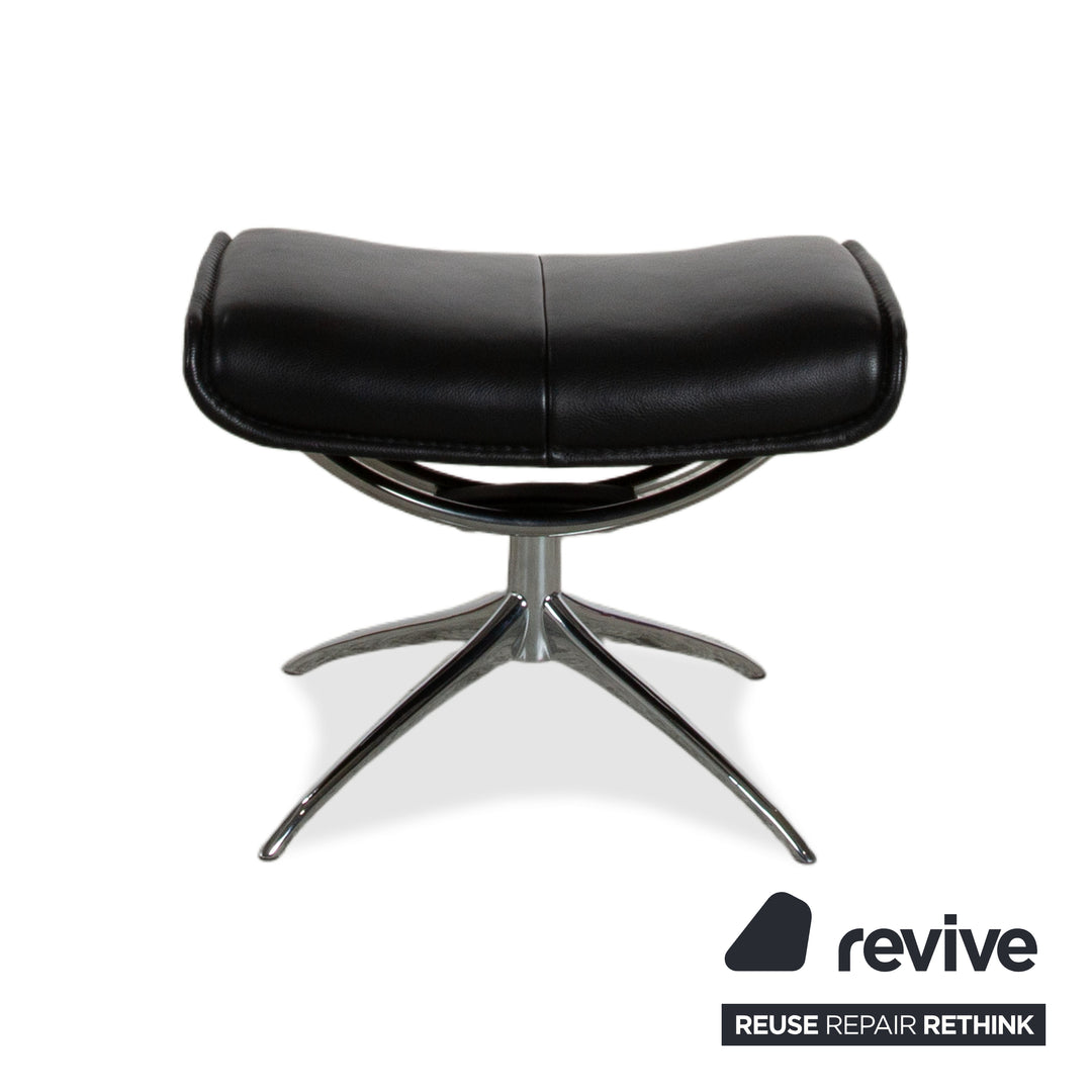 Fauteuil Stressless City en cuir noir avec repose-pieds, fonction manuelle, piètement étoile
