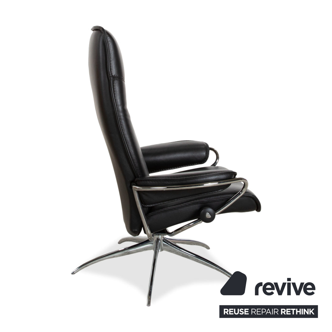 Fauteuil Stressless City en cuir noir avec repose-pieds, fonction manuelle, piètement étoile