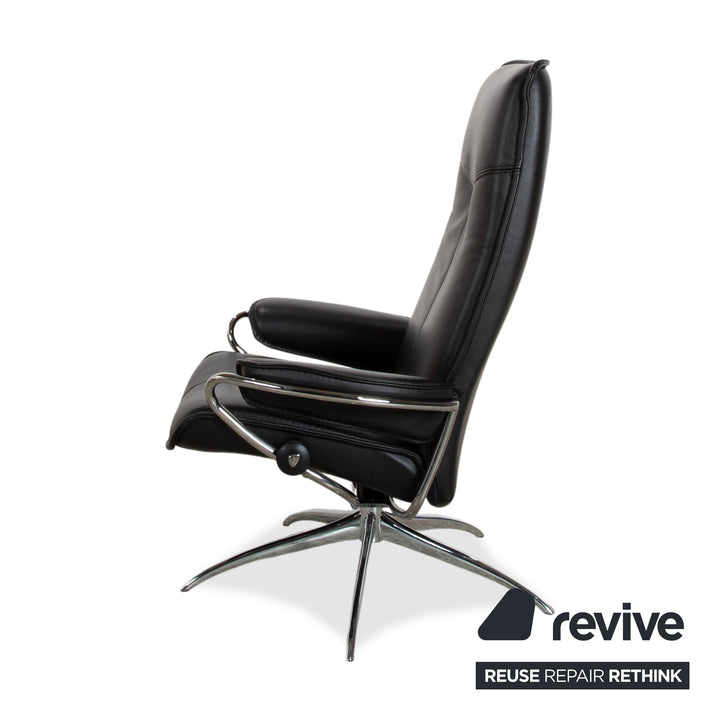 Fauteuil Stressless City en cuir noir avec repose-pieds, fonction manuelle, piètement étoile