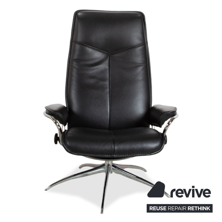 Fauteuil Stressless City en cuir noir avec repose-pieds, fonction manuelle, piètement étoile